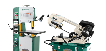two metal-cutting bandsaws on a solid color background
