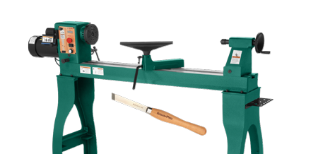 a wood lathe and a lathe chisel on a solid color background