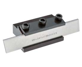 a cut-off blade in a tool holder for a lathe
