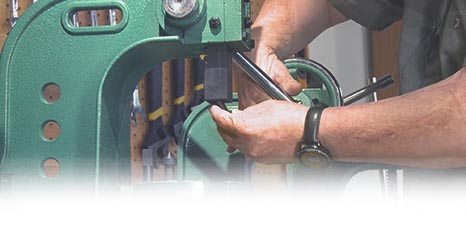 someone setting up a Grizzly arbor press